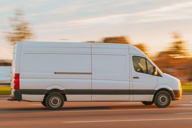 A U-Haul truck speeding down the highway.