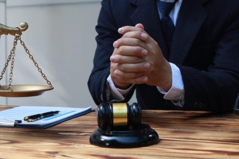 A truck accident lawyer sitting at his desk waiting to file a lawsuit