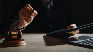 A truck accident lawyer negotiating a higher truck accident settlement.