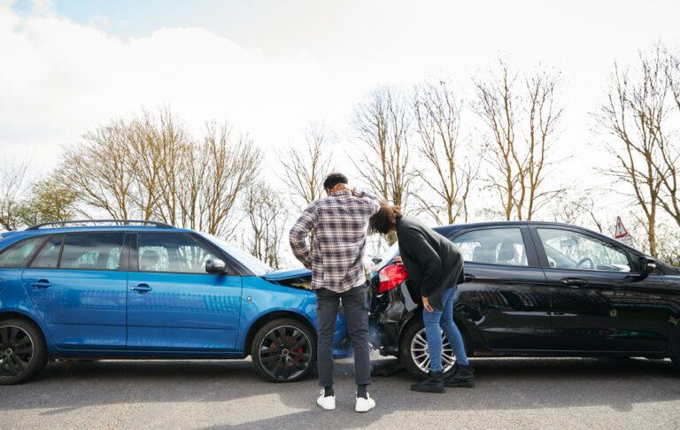 Two cars after a rear-end accident. What is the average rear-end accident settlement