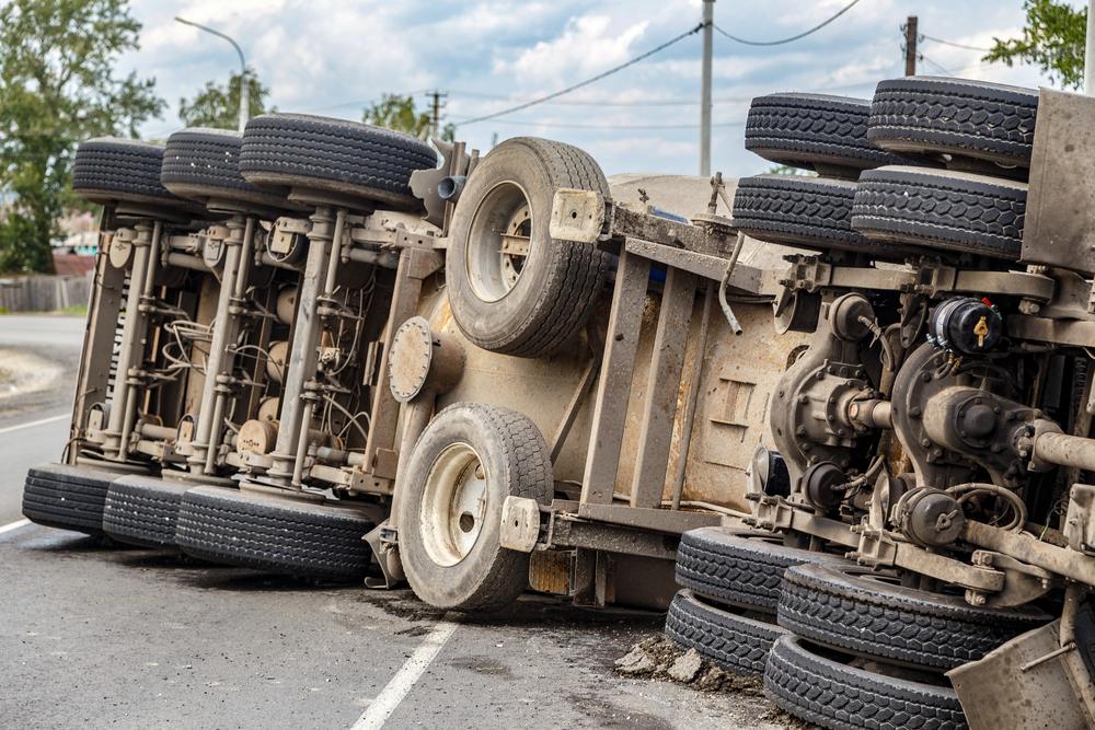 A rolled-over truck after a truck accident. What are some common injuries?