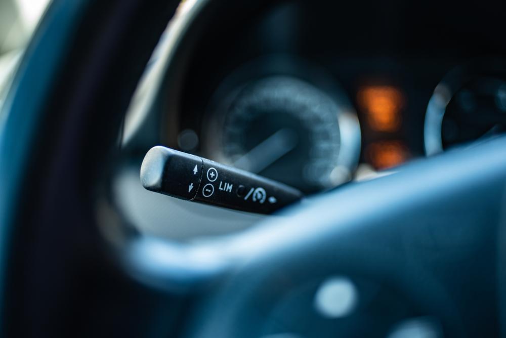 A close-up of a lever in a teen driver’s car. What to do if your teenager is in a car accident.