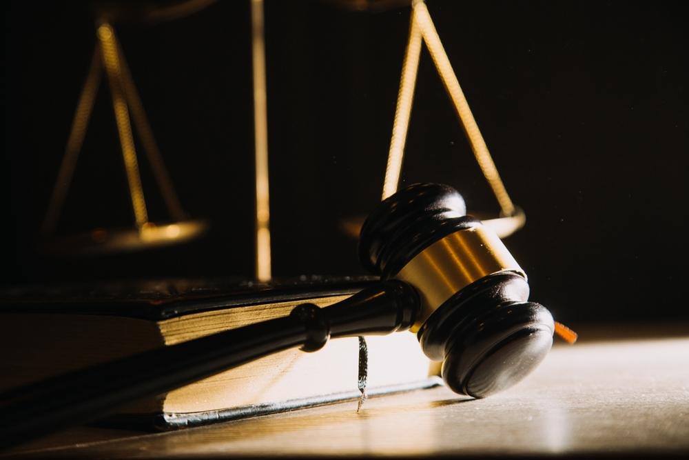 A gavel inside a book. What expenses does PIP typically cover in Utah?