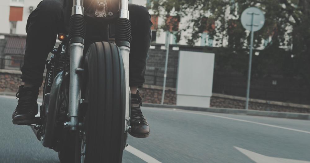 A motorcycle rider on the highway. Is lane-splitting legal in Utah?