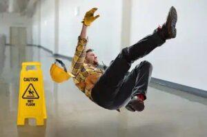 An injured man holding his ankle. What is the average settlement for a slip and fall accident?