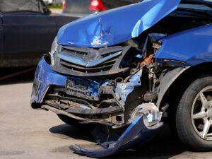 A crashed car on the side of the road. What is the average settlement for a truck accident?